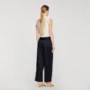 Broek met wijde pijpen en satijnglans Broek met wijde pijpen en satijnglans