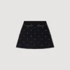 Geborduurde gebreide rok met strass-steentjes Geborduurde gebreide rok met strass-steentjes