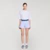 Gestreepte korte broek met jeansdetails Gestreepte korte broek met jeansdetails