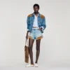 Jeans- en suède short met klinknagels Jeans- en suède short met klinknagels