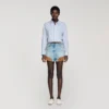 Jeans- en suède short met klinknagels Jeans- en suède short met klinknagels