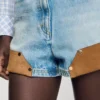 Jeans- en suède short met klinknagels Jeans- en suède short met klinknagels