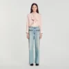Jeans met rechte pijpen en lederen details Jeans met rechte pijpen en lederen details