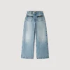 Jeans met rechte pijpen en lederen details Jeans met rechte pijpen en lederen details