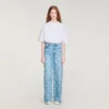 Jeans met wijde pijpen en bloemenprint Jeans met wijde pijpen en bloemenprint