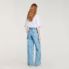 Jeans met wijde pijpen en bloemenprint Jeans met wijde pijpen en bloemenprint