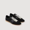 Lage sneakers van leer en suède Lage sneakers van leer en suède