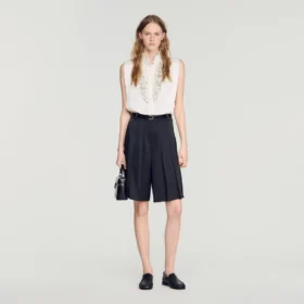 Lange, hooggetailleerde geplooide short