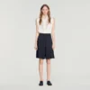 Lange, hooggetailleerde geplooide short Lange, hooggetailleerde geplooide short