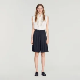 Lange, hooggetailleerde geplooide short