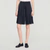 Lange, hooggetailleerde geplooide short Lange, hooggetailleerde geplooide short