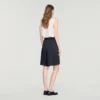 Lange, hooggetailleerde geplooide short Lange, hooggetailleerde geplooide short