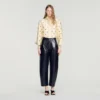 Leren broek met wijd uitlopende pijpen Leren broek met wijd uitlopende pijpen