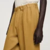 Linnen broek met wijde pijpen en elastische tailleband Linnen broek met wijde pijpen en elastische tailleband