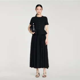 Maxijurk van gebreid materiaal met peplum