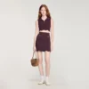 Mini-gebreide rok met decoratieve details Mini-gebreide rok met decoratieve details