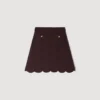 Mini-gebreide rok met decoratieve details Mini-gebreide rok met decoratieve details