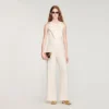 Rechte broek met knoopsluiting en split Rechte broek met knoopsluiting en split