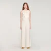Rechte broek met knoopsluiting en split Rechte broek met knoopsluiting en split