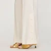 Rechte broek met knoopsluiting en split Rechte broek met knoopsluiting en split