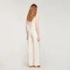 Rechte broek met knoopsluiting en split Rechte broek met knoopsluiting en split