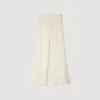 Rechte broek met knoopsluiting en split Rechte broek met knoopsluiting en split