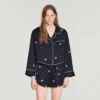Shorts met kralen en strass Shorts met kralen en strass