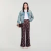Soepelvallende broek met bloemenprint Soepelvallende broek met bloemenprint