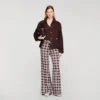 Soepelvallende broek met bloemenprint Soepelvallende broek met bloemenprint