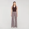 Soepelvallende broek met bloemenprint Soepelvallende broek met bloemenprint