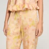 Soepelvallende broek met bloemenprint Soepelvallende broek met bloemenprint