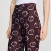 Soepelvallende broek met bloemenprint Soepelvallende broek met bloemenprint