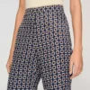 Soepelvallende broek met bloemenprint Soepelvallende broek met bloemenprint