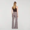 Soepelvallende broek met bloemenprint Soepelvallende broek met bloemenprint