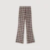 Soepelvallende broek met bloemenprint Soepelvallende broek met bloemenprint