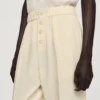 Soepelvallende broek met elastische tailleband Soepelvallende broek met elastische tailleband