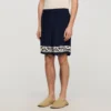 Soepelvallende korte broek met contrasterend patroon