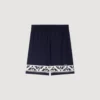 Soepelvallende korte broek met contrasterend patroon