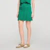 Mini-gebreide rok met decoratieve details Mini-gebreide rok met decoratieve details