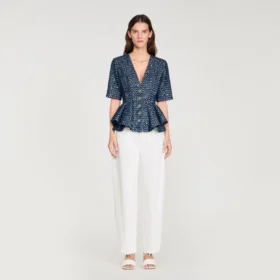 Top met peplum en pailletten