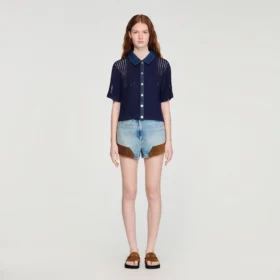 Top van gehaakt materiaal en Jeans