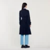 Trenchcoat met geplooid inzetstuk