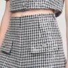 Tweedshort met pailletten in houndstooth-patroon Tweedshort met pailletten in houndstooth-patroon