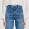 Uitlopende, vervaagde jeans Uitlopende, vervaagde jeans